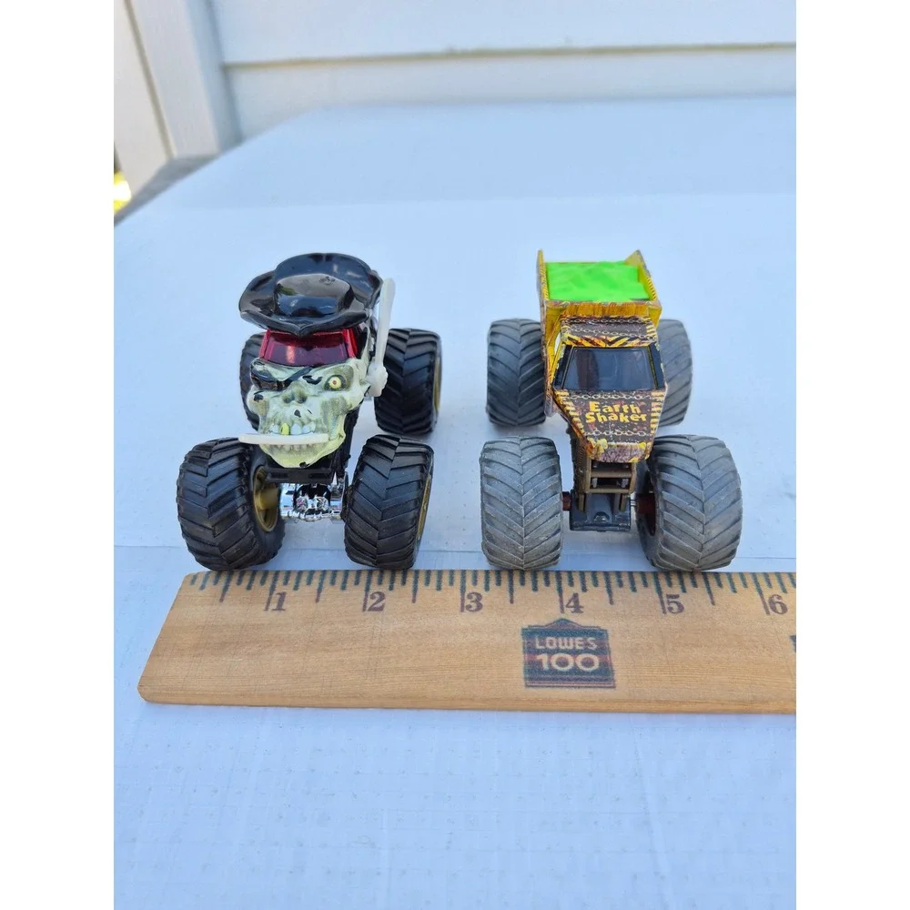 Monster Jam Pirates Curse and Zombie vs Hunter Earth Shaker Die-Cast Truck Lot
